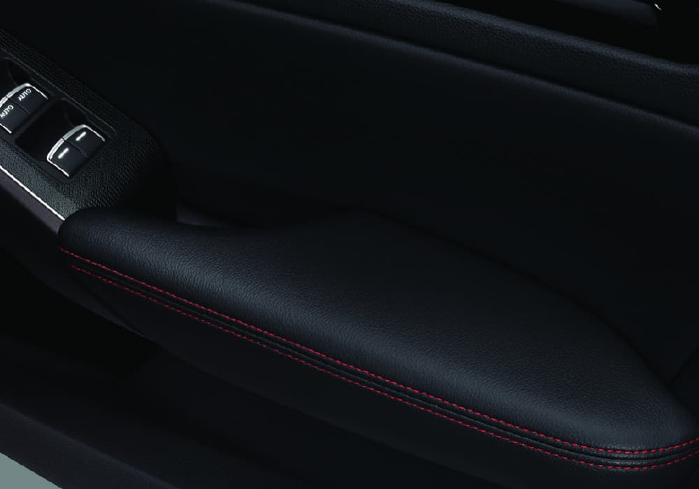 Door Armrest with Red Stitches